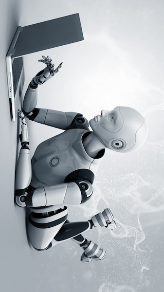 Humanoid robot using a laptop like a teenager